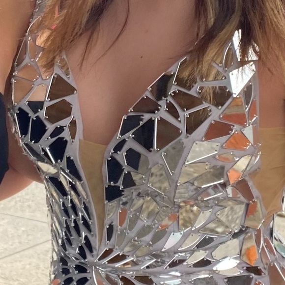 worn once there’s padding stitched in the chest area but can easily be removed. - Picture 3 of 3